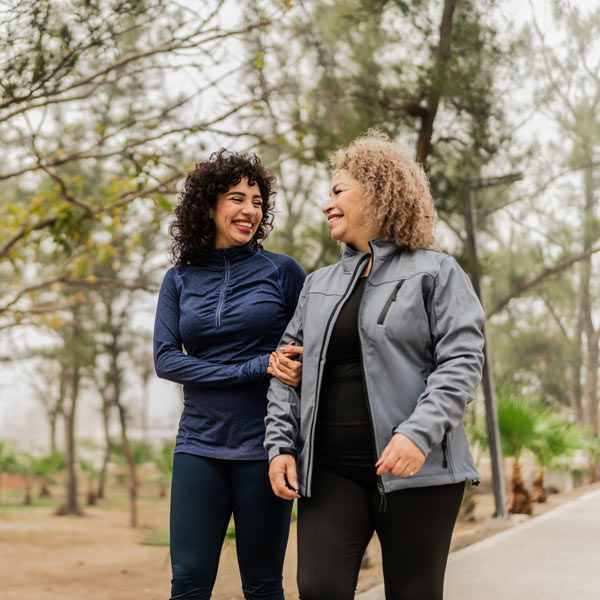 two women walking on the street